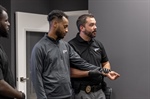 Why is Post-Specific Training Critical in Security Guard Performance?